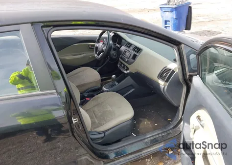 2014 Kia Rio Lx z USA, uszkodzony, nr VIN KNADM5A37E6356071